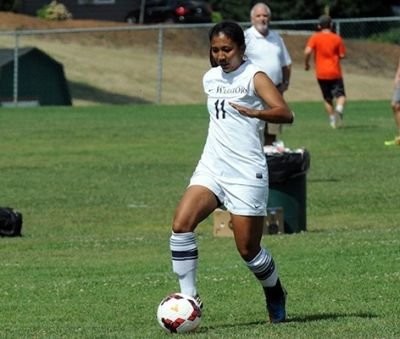 Kaylyn Siobal dished out her first assist of the 2014 campaign in Sunday's victory. Photo Courtesy: Corban Athletics 