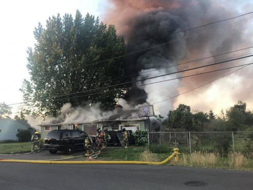 House fire in the 4300 block of Munkers St SE, Salem : Photo Courtesy of Marion County Fire