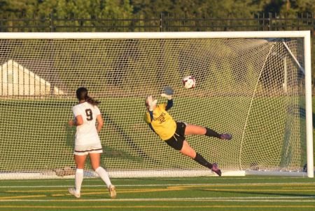 Ally Swanson Records Season High 13 Saves Against Bulldogs. Photo Courtesy: George Fox Athletics