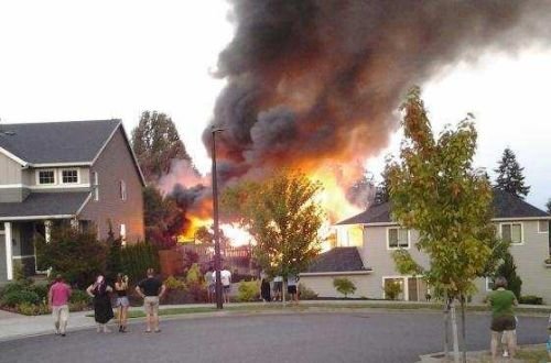 Tualatin Valley Fire and Rescue battled a three alarm fire Saturday evening in Tigard, Oregon that damaged two homes. Photo Courtesy: Tualatin Valley Fire and Rescue