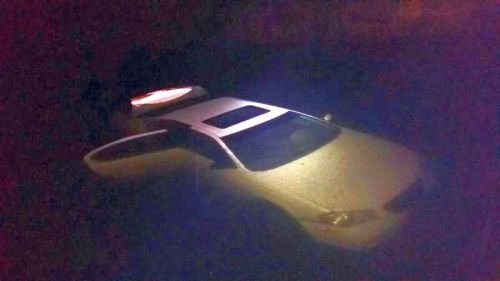 A Tillamook man was arrested for DUII Wednesday night after driving his car into the Trask River at Carnahan Park in Tillamook. Photo Courtesy: Oregon State Police