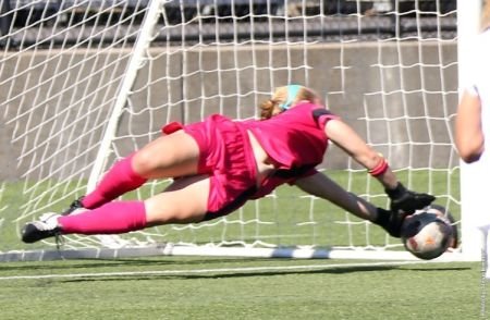 Junior goalkeeper Caitlin Plese made a save on an Oregon penalty kick in the 89th minute (pictured a